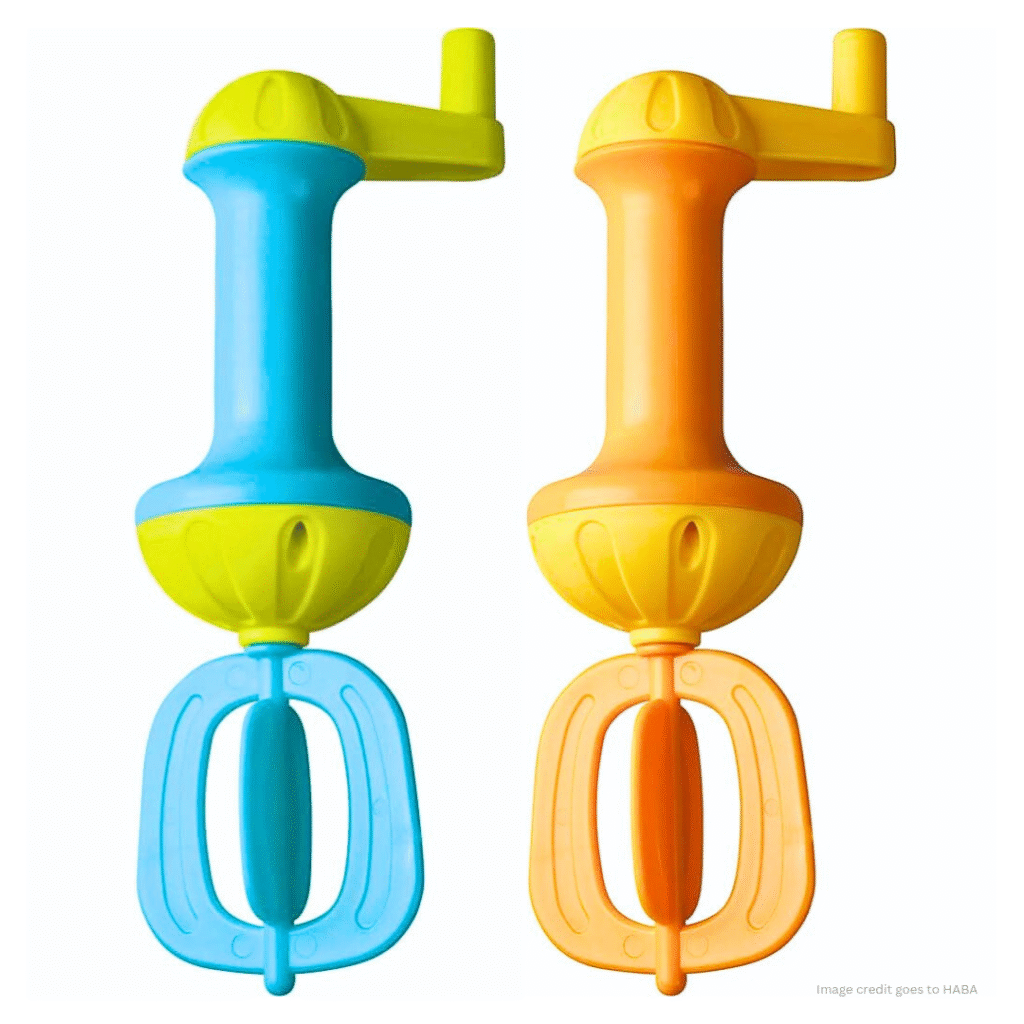 An image of two toy whisk along with a text - 'image credit goes to HABA'.