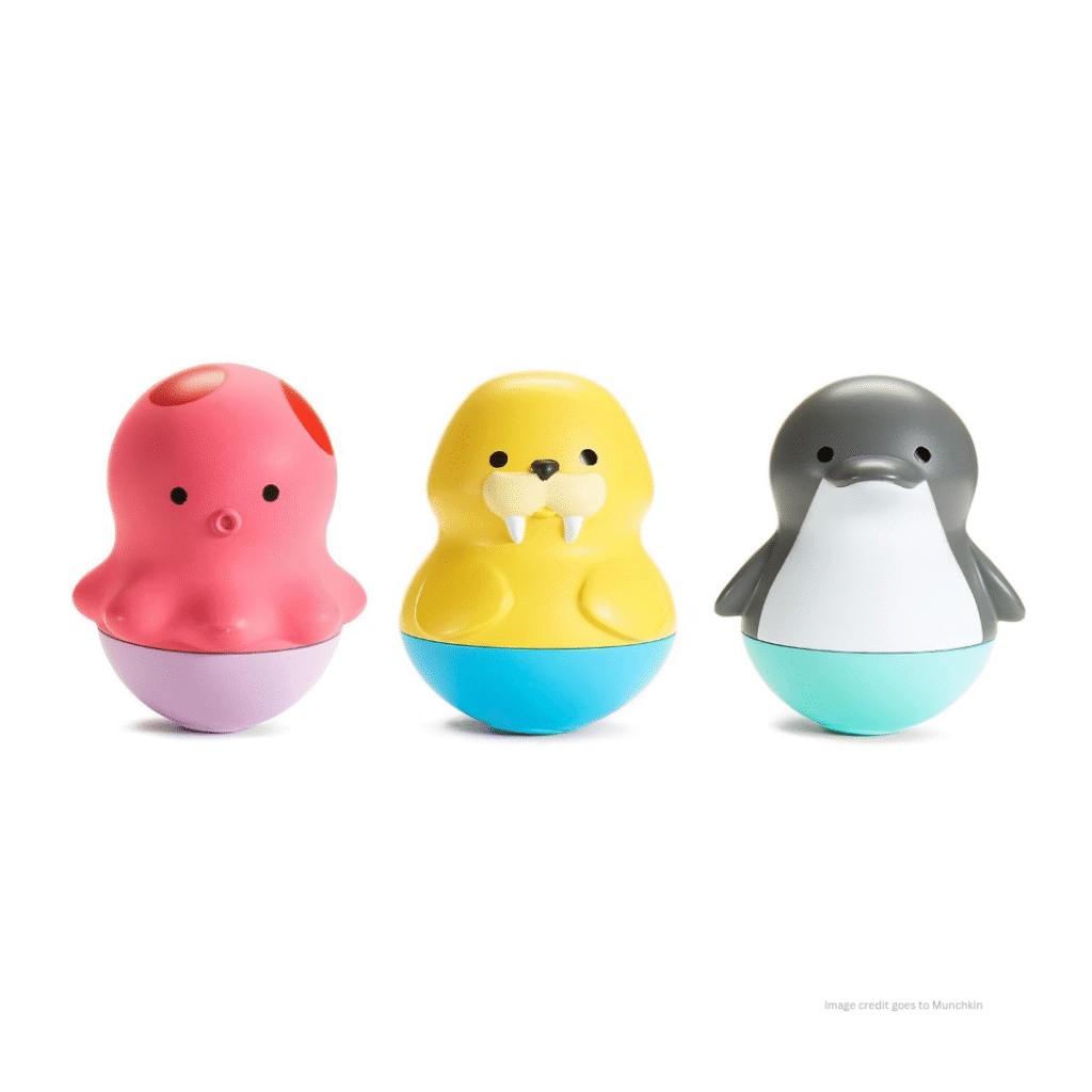 An image of three soft toys for baby's bath along witha visible text - 'image credit goes to Munchkin'.